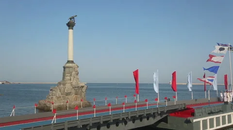Ceremonial flags on a floating wharf Stock Footage 40486408