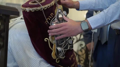 Ceremony featuring a Torah Scroll along with Attendees dressed in Traditional Stock Footage 291006036