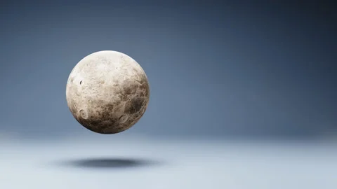 Ceres Asteroid Spinning on Studio Blue Background Stock Footage 239738312