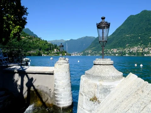 Cernobbio, Como lake, Italy. Boat recovery and view towards Menaggio Stock Footage