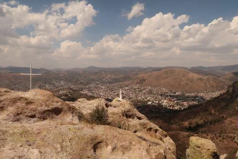The Cerro de la Bufa with its Cross, the sculpture/statue of St. Virgin Mar.. Stock Photos