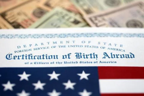 Certification of Birth Abroad with US flag and US dollar money bills Stock Photos