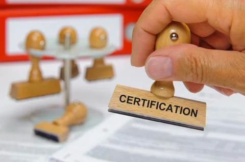 Certification printed on rubber stamp Stock Photos