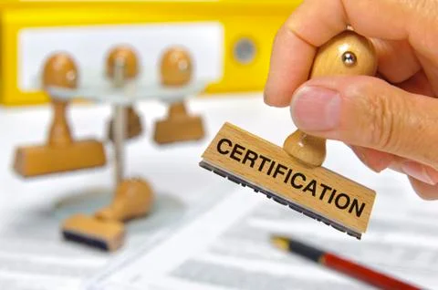 Certification printed on rubber stamp Stock Photos
