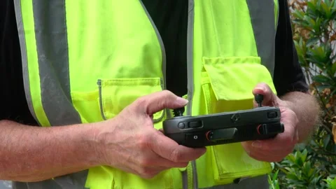 Certified Drone Pilot Holding Remote Controller Before Commercial Flight Stock Footage 342222625