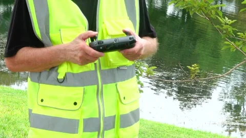 Certified Drone Pilot Holding Remote Controller Before Commercial Flight Stock Footage 342222638