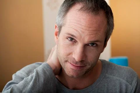 Cervicalgia in a man Stock Photos