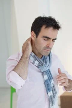 Cervicalgia in a man Stock Photos