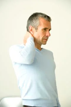 Cervicalgia in a man Stock Photos
