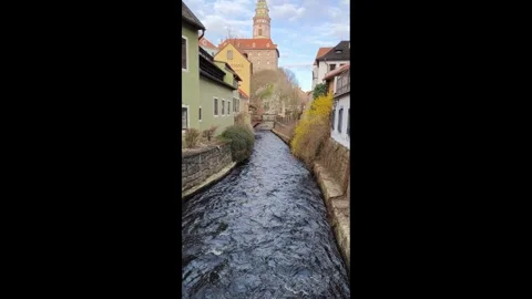 Cesky Krumlov. View from the bridge of the Vltava River and the Clock Tower Stock Footage 302484821