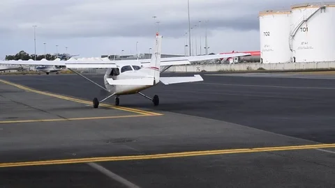 Cessna 172 plane idling pre flight Stock Footage 76561239
