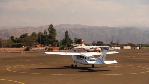 Cessna airplanes getting ready for the flight over Nazca lines desert. 스톡 동영상 202599102