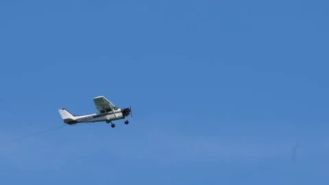 Cessna Plane in Clear Blue Sky Stock Footage 250472707