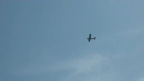 Cessna training airplane fly overhead in the sky Stock Footage 134138623