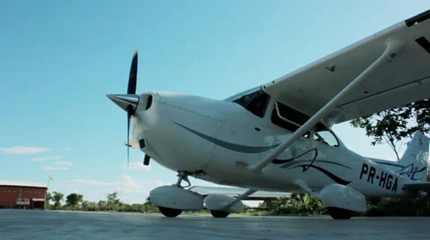 A Cessna-Type Single Engine Airplane turning on its engine Stock Footage 33702245