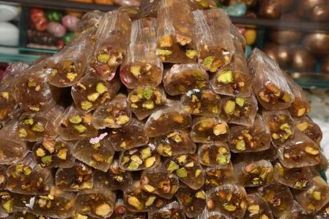 Cevizli sucuk made by dipping a string with walnuts into a grape molasses mix Stock Photos