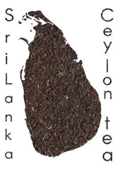 Ceylon map shape made of  black tea leaves Stock Photos