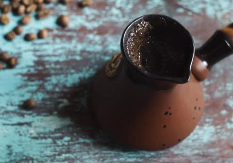 A cezve is a pot designed specifically to make Turkish coffee Stock Photos