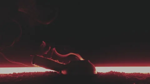 Cezve stands on coffee beans in red light Video stock 156042851