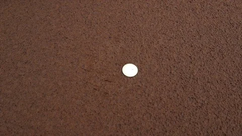 CFA coin on the black sand Stock Footage 81065168