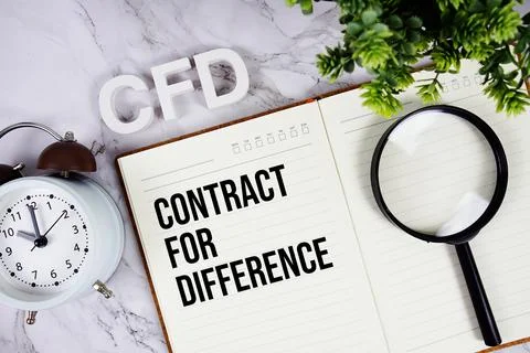 CFD - Contract For Difference acronym on notepad, Business concept background Stock Photos