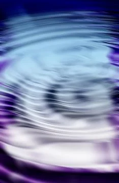 CGI abstract ripple effect of liquid with purple reflection of wavy pattern and Stock Photos