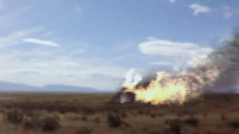 CGI animation of a flying saucer in flame crashing on a field in the countryside Video stock 202890337