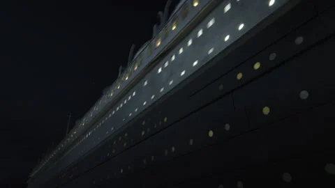 CGI of Titanic sailing at night, flyover from bow to stern of ship - Recreation Stock Footage 202906277