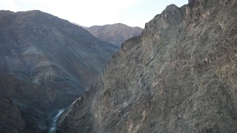 CH-47 Chinook flying between mountains of Afghanistan Stock Footage 87318577