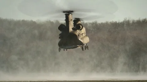 CH-47 Chinook Helicopter hovering over water Stock Footage 73754060