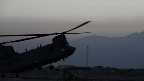 CH-47 Chinook hovering at Bagram Airfield, Afghanistan Stock Footage 98180101