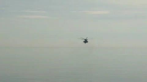 CH-53 Helicopter hovers over water (HD) c Stock-Footage 696722