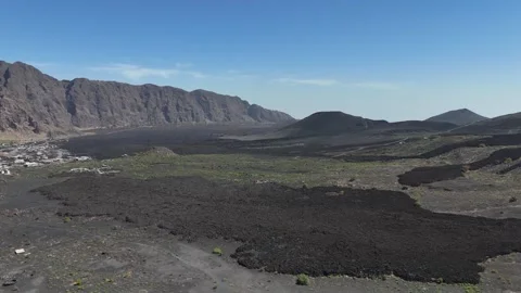 Chã das Caldeiras basin, set against the towering Bordeira cliff wall on Fogo Stockbeeldmateriaal 334996891