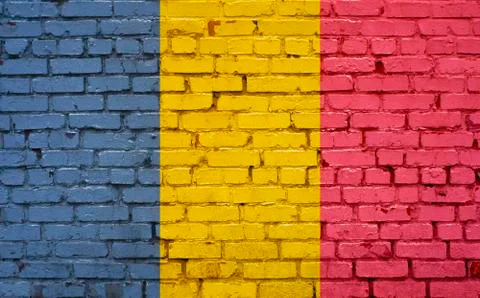 Chad flag painted on old brick wall Stock Photos