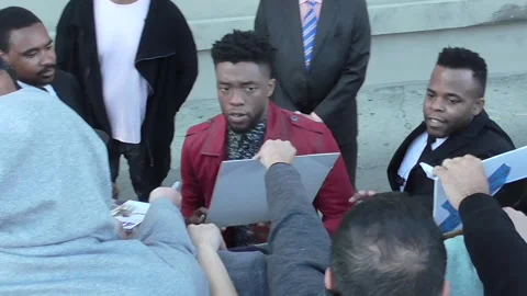 Chadwick Boseman signs autographs for fans arriving to Jimmy Kimmel Live! Stock Footage