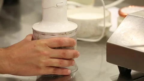 Chafe makes meal 2 Stock Footage 312947024