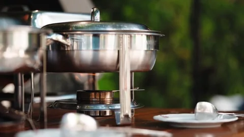 Chafing Dish Heated by Burner on Buffet Table Stock Footage 346496729