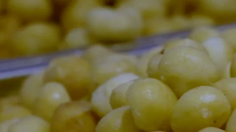 Chafing Dish Of MAcademia Nuts Stock Footage 136395110