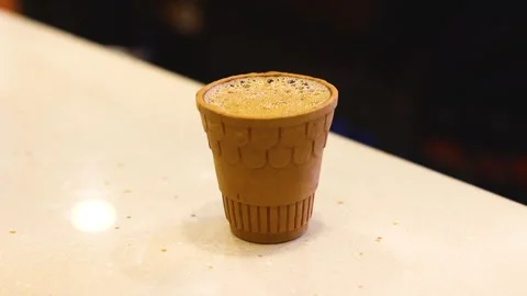 Chai or tea in a clay pot Stock Footage 297932066