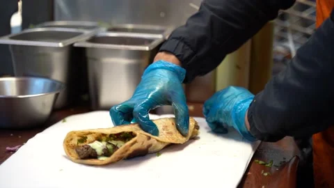 Chai wrap staff is making a Chai chicken Stock Footage 167009682
