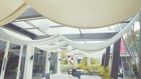 Chaid and Table on Outdoor Dining Room Stock Footage 162106346