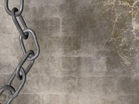 Chain against a wall background Stock Footage 73354406