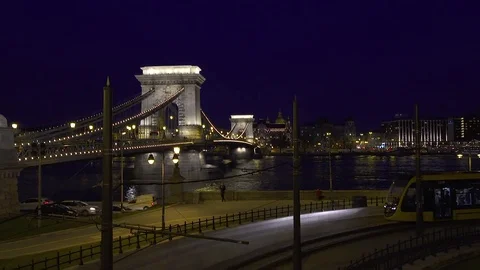 Chain Bridge by night with moving tram Stock Footage 79760668