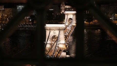 Chain bridge view in Budapest at night through the metal fence Video stock 74236815