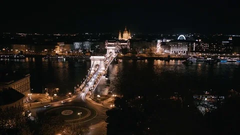 Chain bridge view with St. Stephen's Basilica in Budapest at night Video stock 74492617