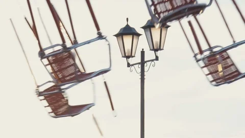 The chain carousel in the park. Summer. Sunset. Stock Footage 104246891