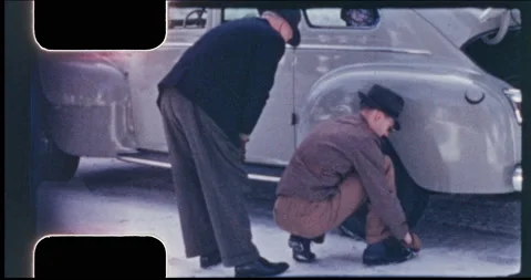 Chain-up to cross Highway 50 Echo Summit after a heavy snowfall, 1943 Stock Footage 197342914