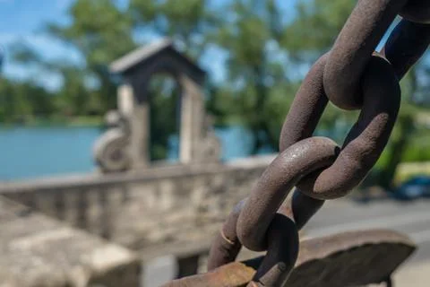 A chain of a drawbridge grilles Stock Photos