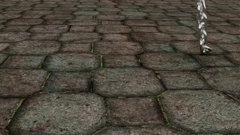 Chain Drop onto Cobblestone Stock Footage 107172895