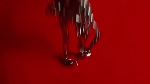 Chain falling from above in slow motion Stock Footage 141685346